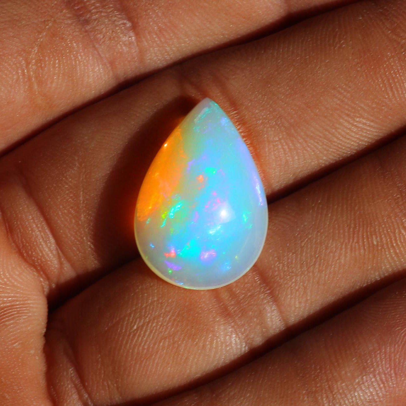 Ethiopian Welo Opal Pear Cabochon: Rainbow Fire Gemstone, 15x20 mm