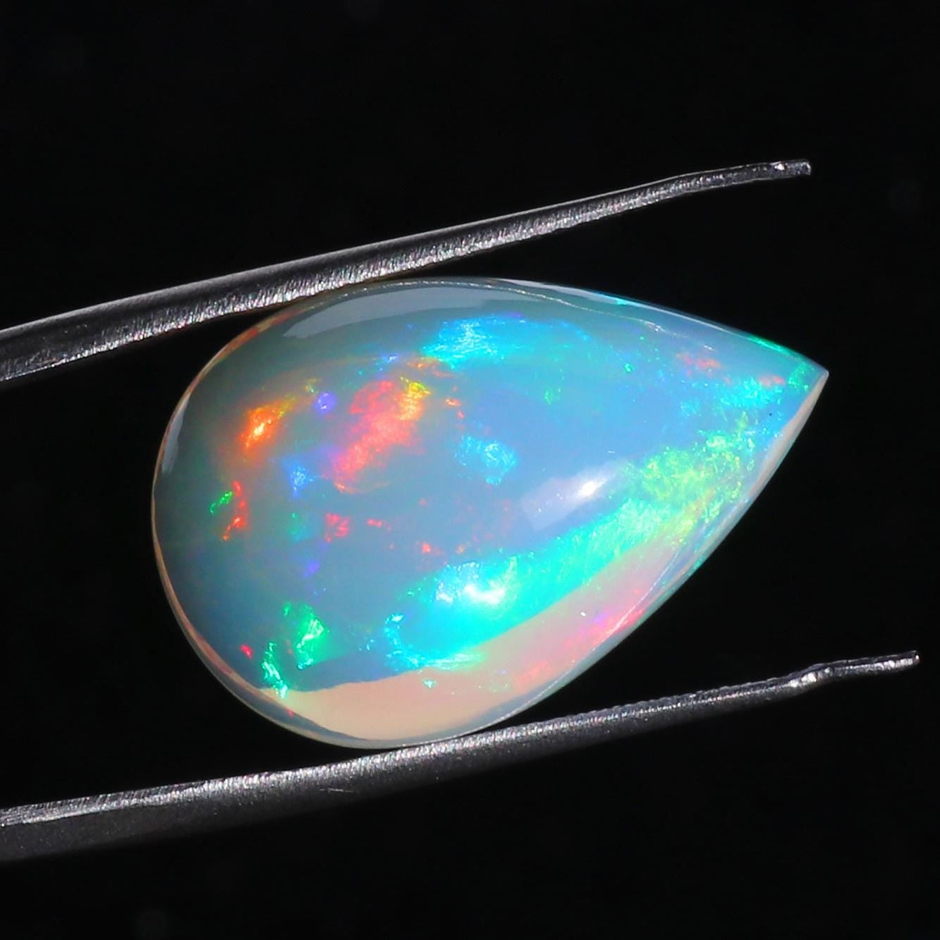 Ethiopian Welo Opal Pear Cabochon: Rainbow Fire Gemstone, 15x20 mm
