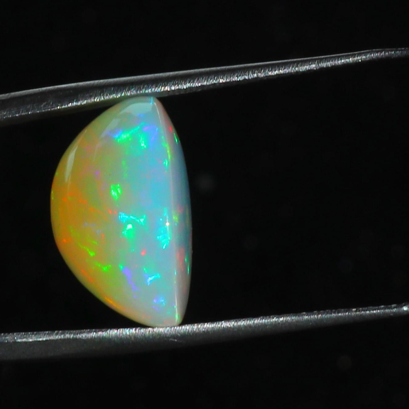 Ethiopian Welo Opal Pear Cabochon: Rainbow Fire Gemstone, 15x20 mm