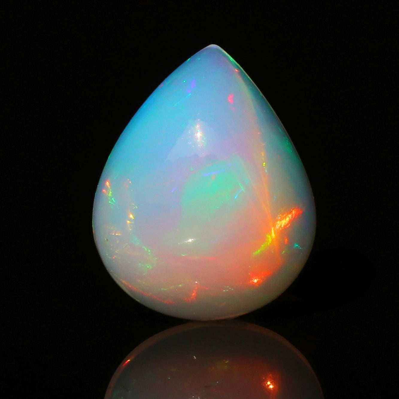 Welo Ethiopian Opal Cabochon: 5.52 Carat Pear-Shape Multicolor Gemstone