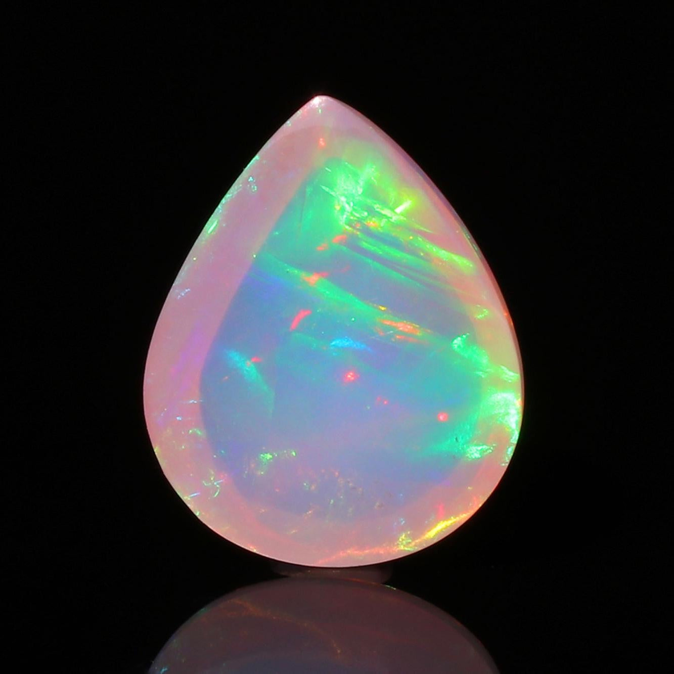 Welo Ethiopian Opal Cabochon: 5.52 Carat Pear-Shape Multicolor Gemstone