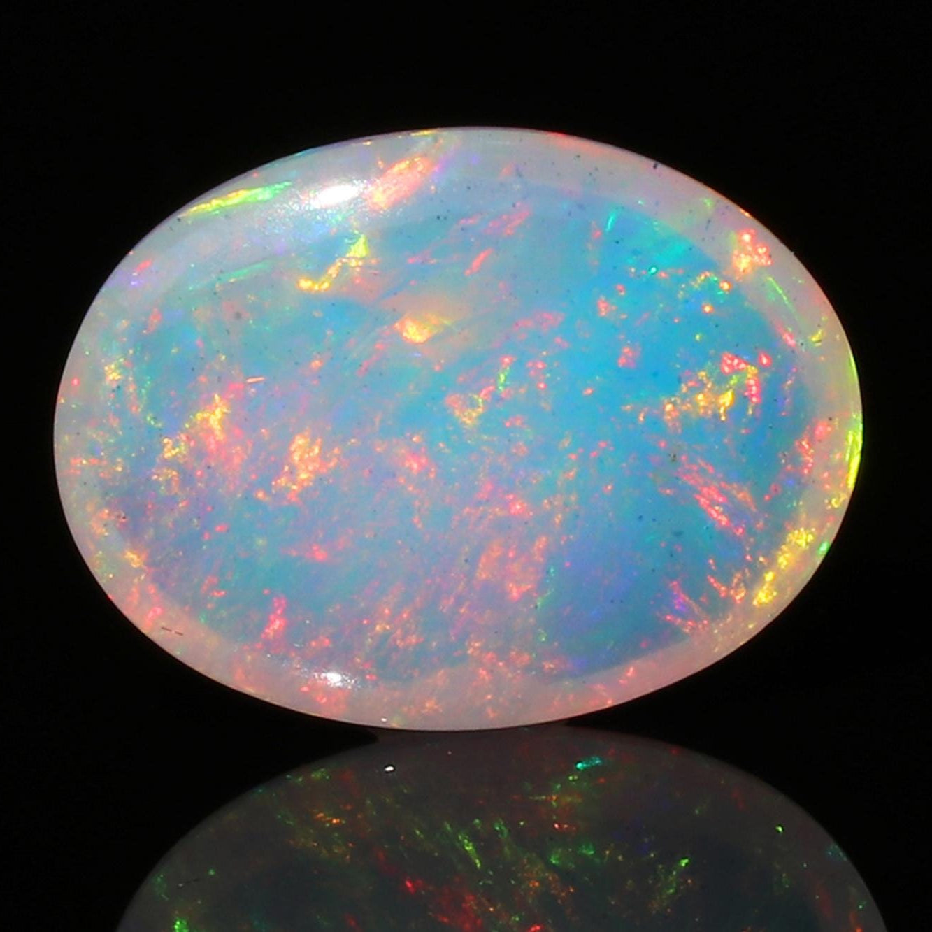 Welo Ethiopian Fire Opal Cabochon: Rainbow Gemstone for Jewelry (1.67 Cts, 13x8 mm