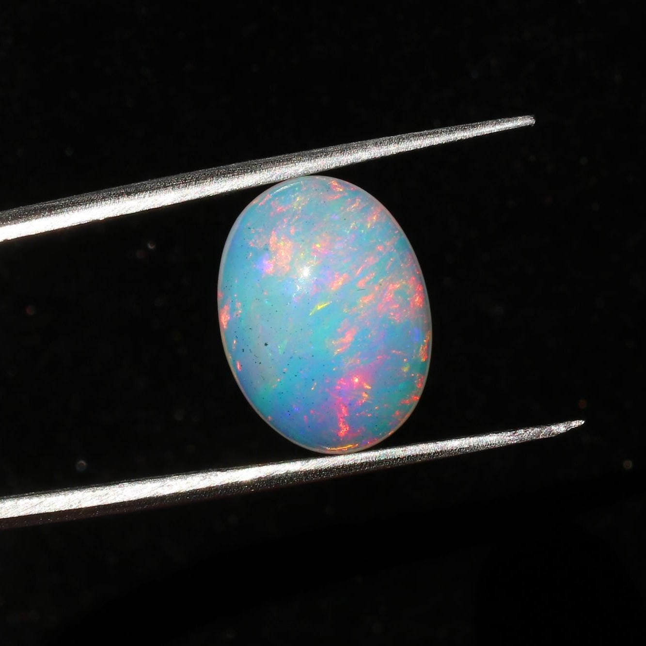 Welo Ethiopian Fire Opal Cabochon: Rainbow Gemstone for Jewelry (1.67 Cts, 13x8 mm