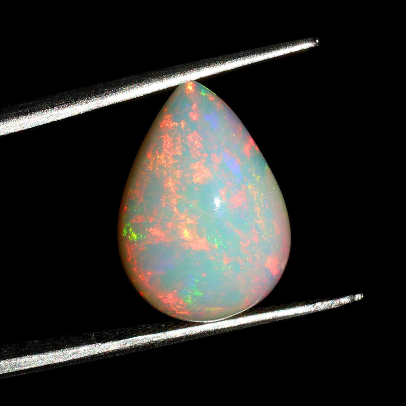 Welo Ethiopian Opal Pear Cabochon: 7.85 Ct Natural Gemstone, 13x19 mm