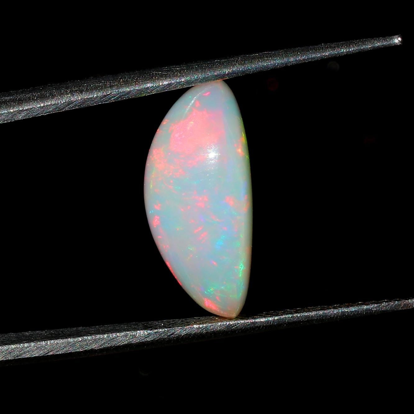 Welo Ethiopian Opal Gemstone: Oval Cabochon, October Birthstone