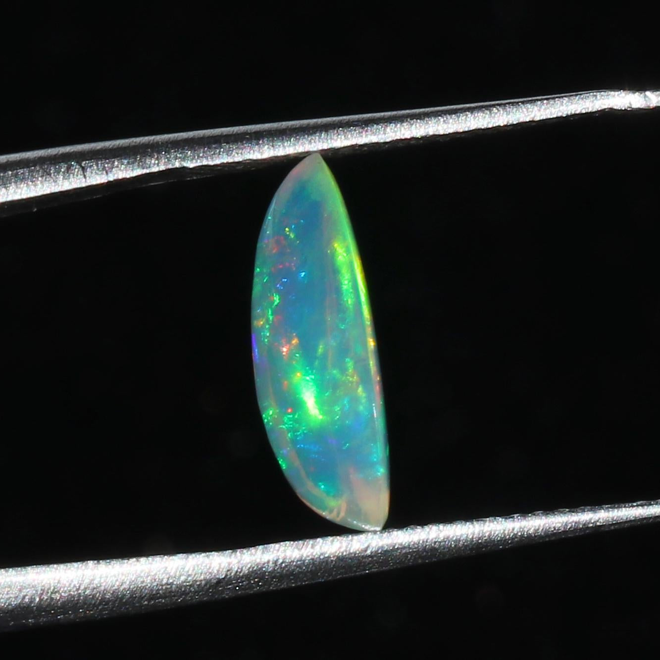 Welo Ethiopian Fire Opal Cabochon: Rainbow Gemstone for Jewelry (1.67 Cts, 13x8 mm