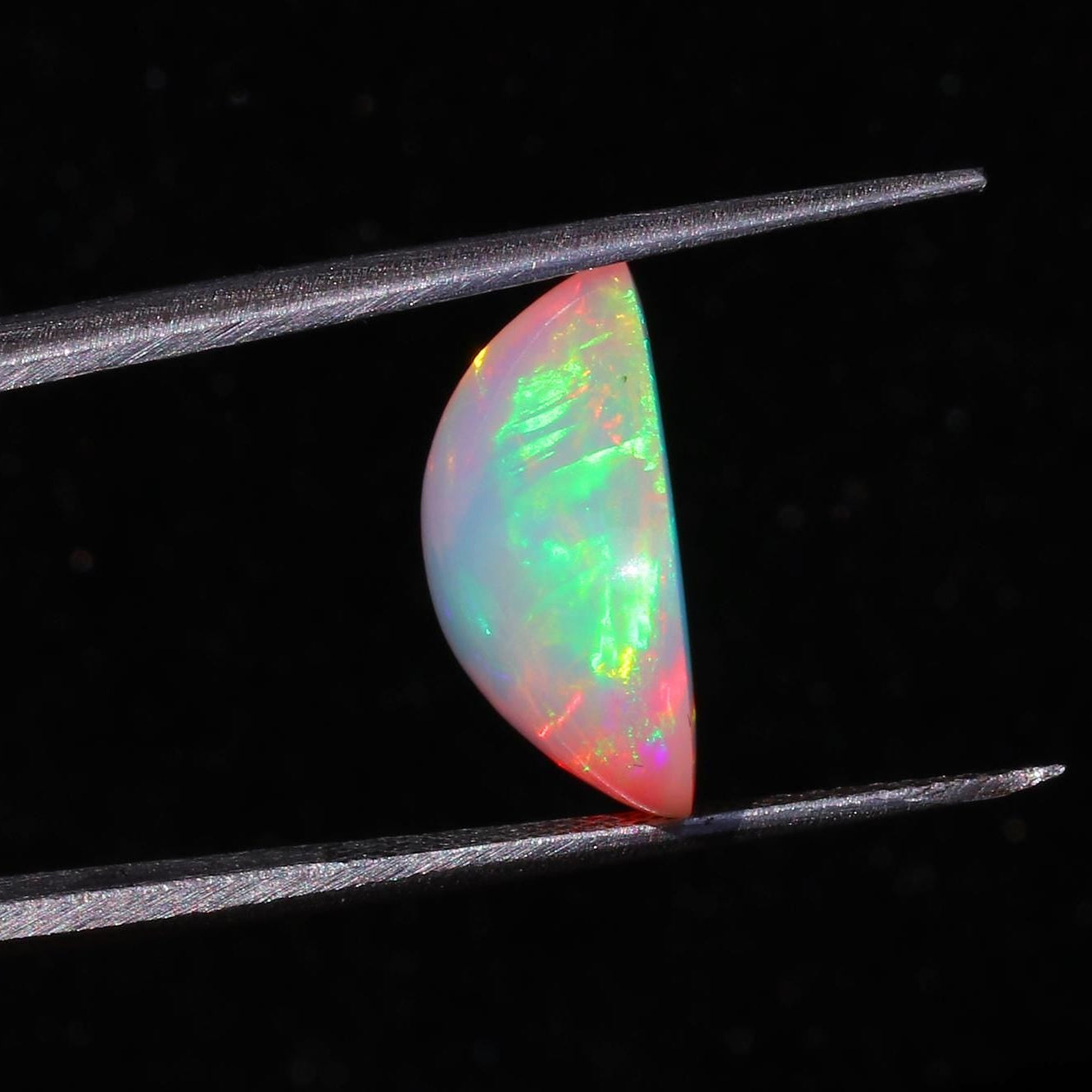 Welo Ethiopian Opal Cabochon: 5.52 Carat Pear-Shape Multicolor Gemstone