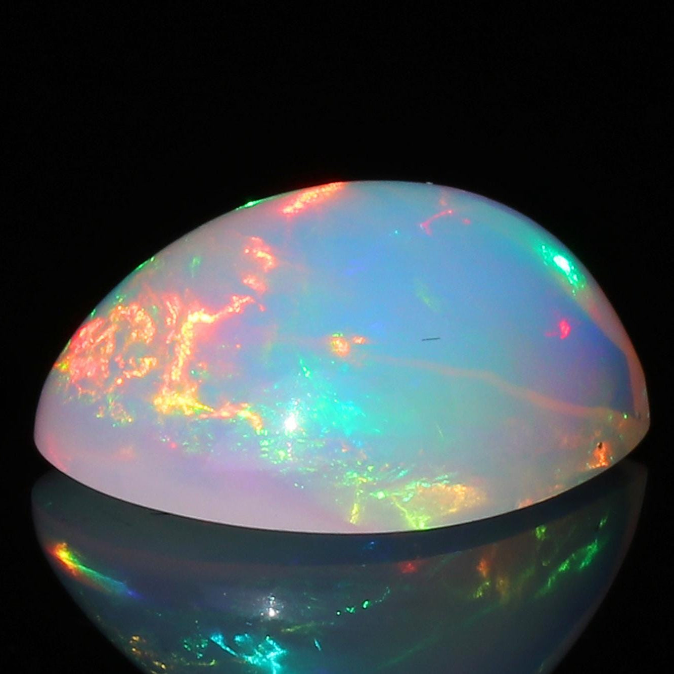 Welo Ethiopian Opal Cabochon: 5.52 Carat Pear-Shape Multicolor Gemstone