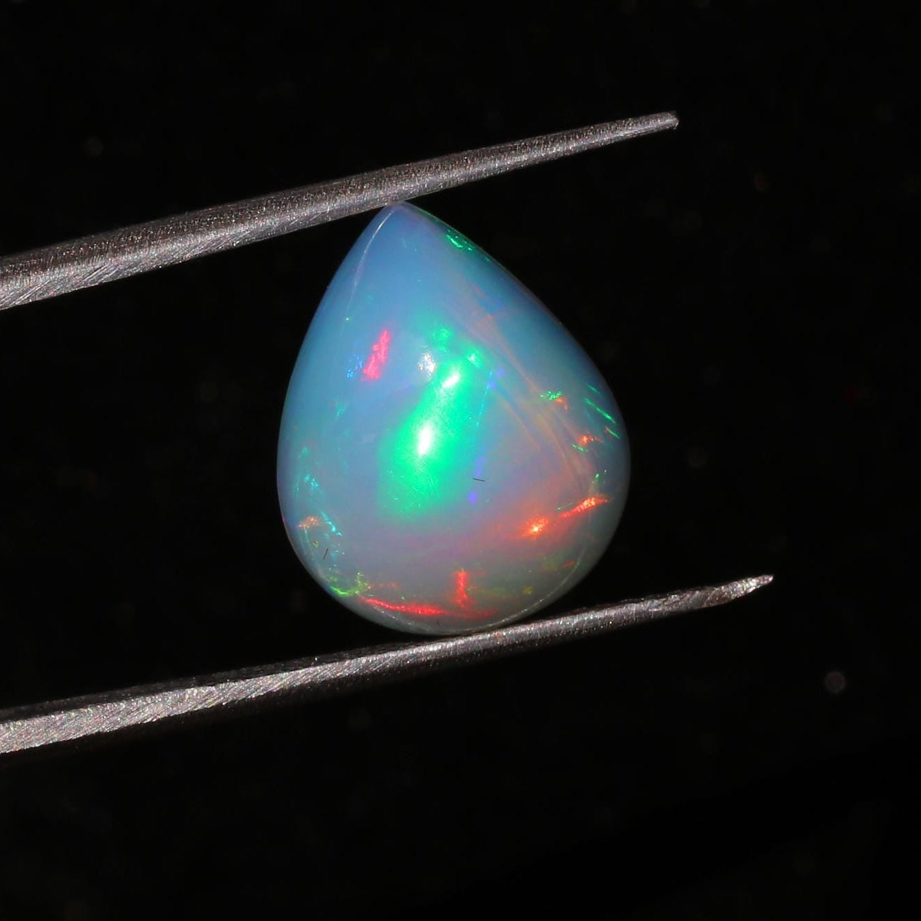 Welo Ethiopian Opal Cabochon: 5.52 Carat Pear-Shape Multicolor Gemstone