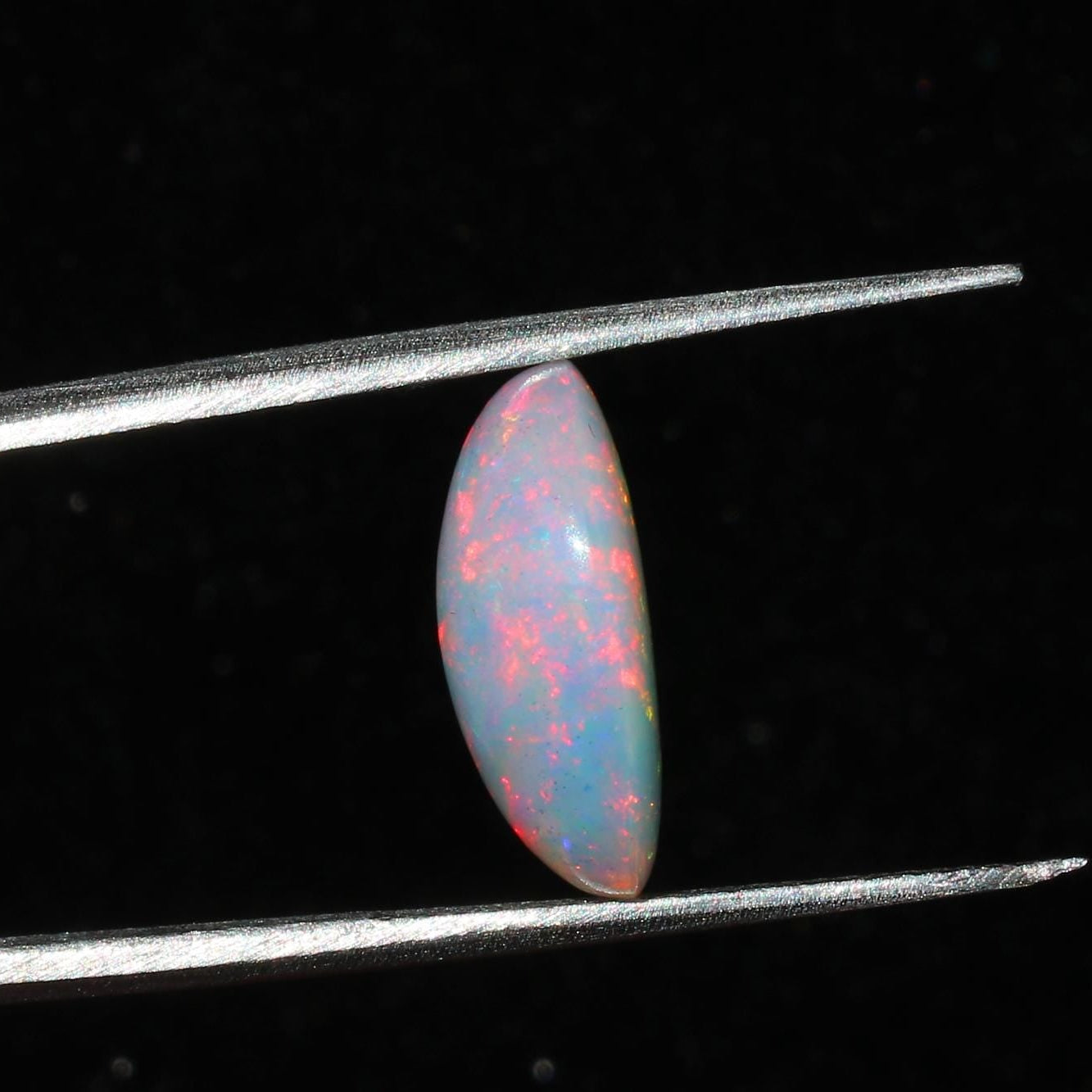 Welo Ethiopian Fire Opal Cabochon: Rainbow Gemstone for Jewelry (1.67 Cts, 13x8 mm