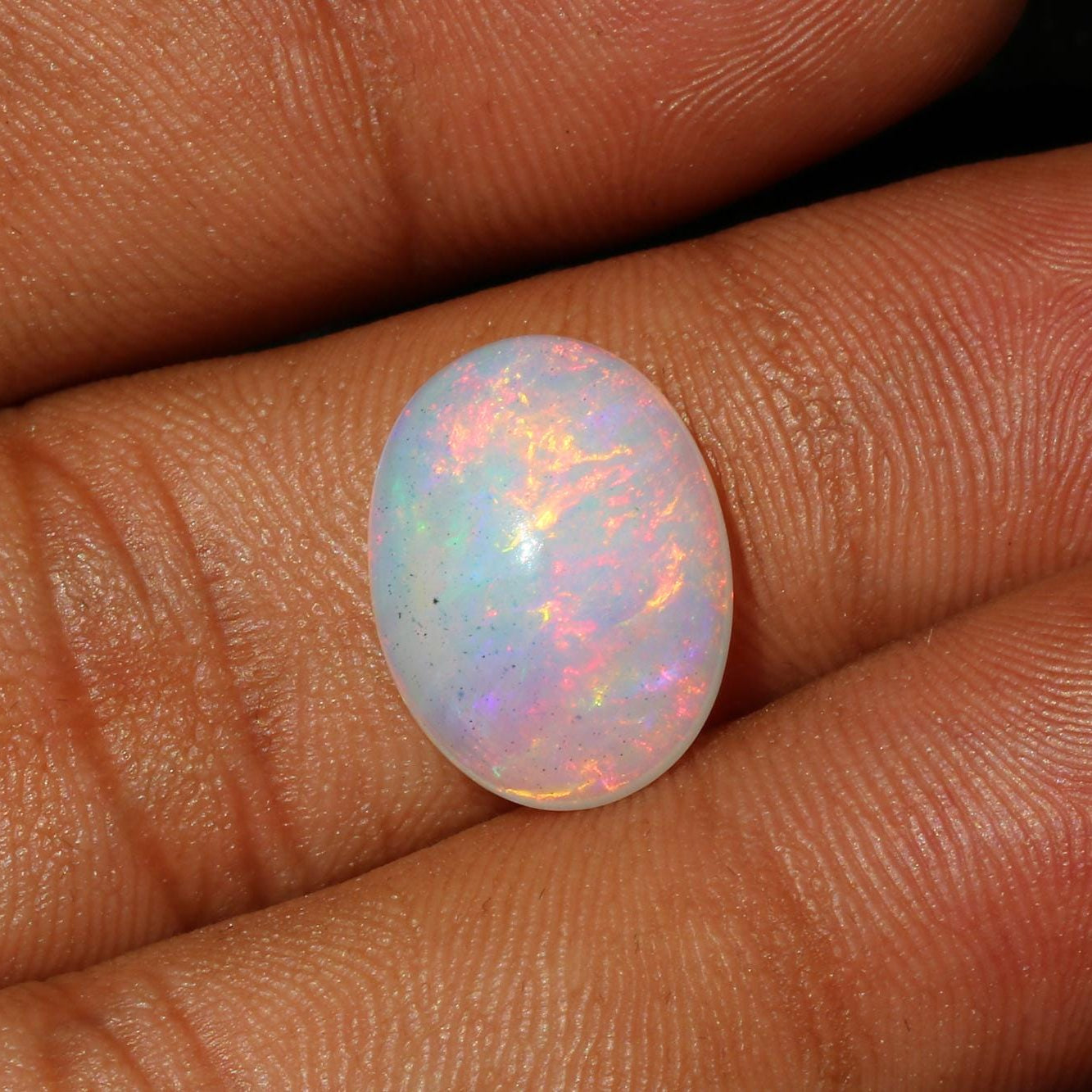 Welo Ethiopian Fire Opal Cabochon: Rainbow Gemstone for Jewelry (1.67 Cts, 13x8 mm