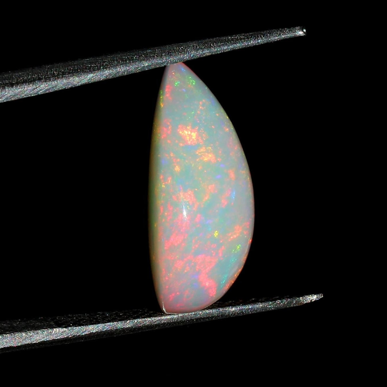 Welo Ethiopian Opal Pear Cabochon: 7.85 Ct Natural Gemstone, 13x19 mm