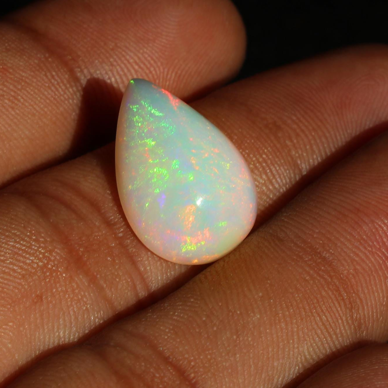 Welo Ethiopian Opal Pear Cabochon: 7.85 Ct Natural Gemstone, 13x19 mm