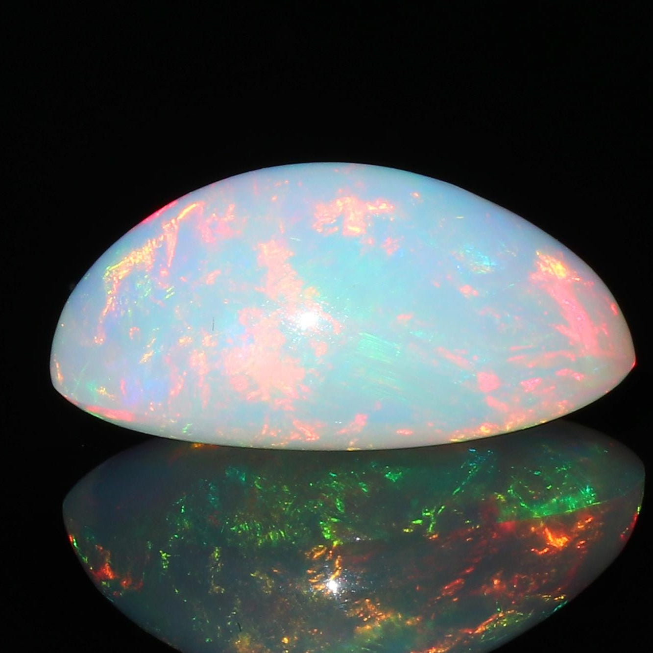 Welo Ethiopian Opal Gemstone: Oval Cabochon, October Birthstone