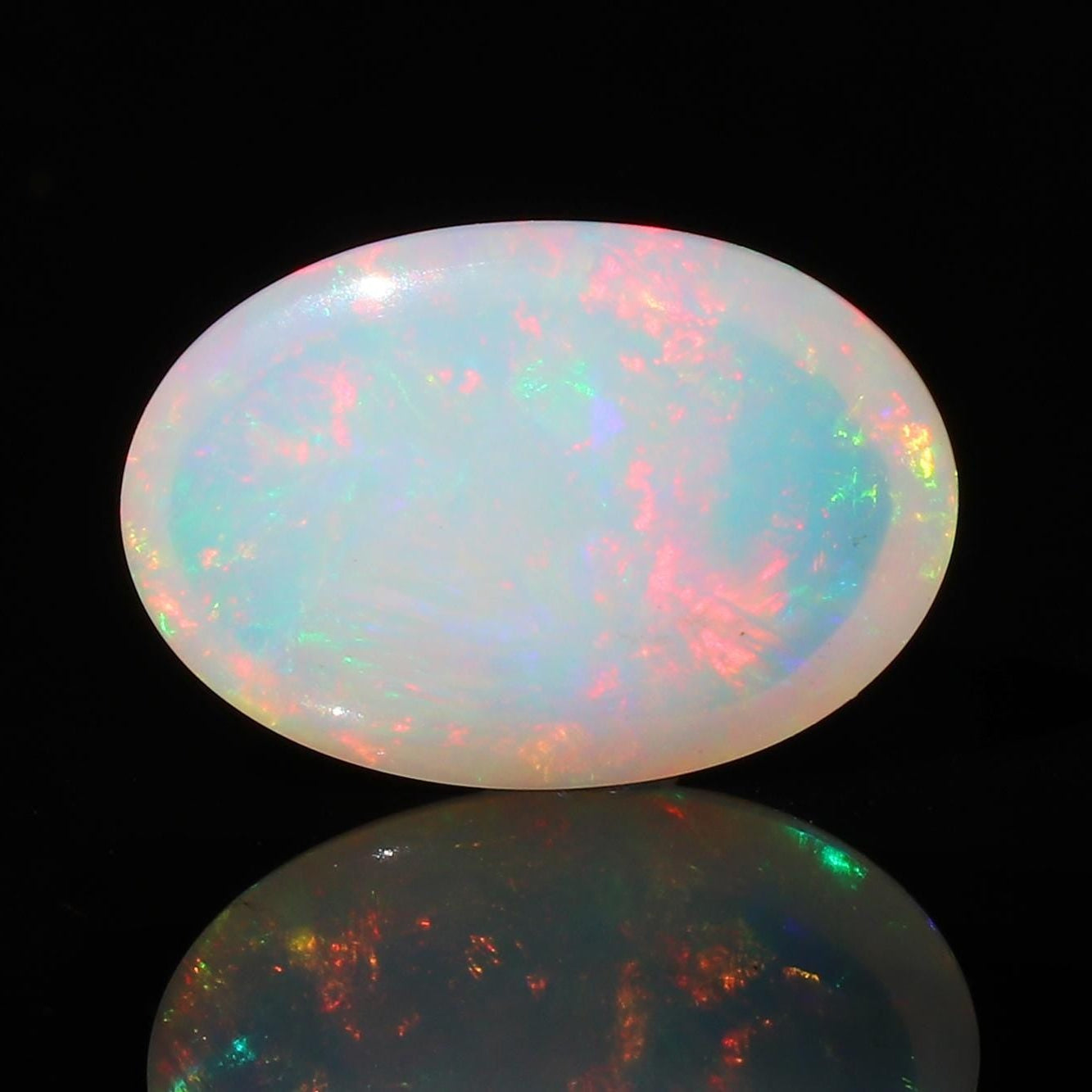 Welo Ethiopian Opal Gemstone: Oval Cabochon, October Birthstone