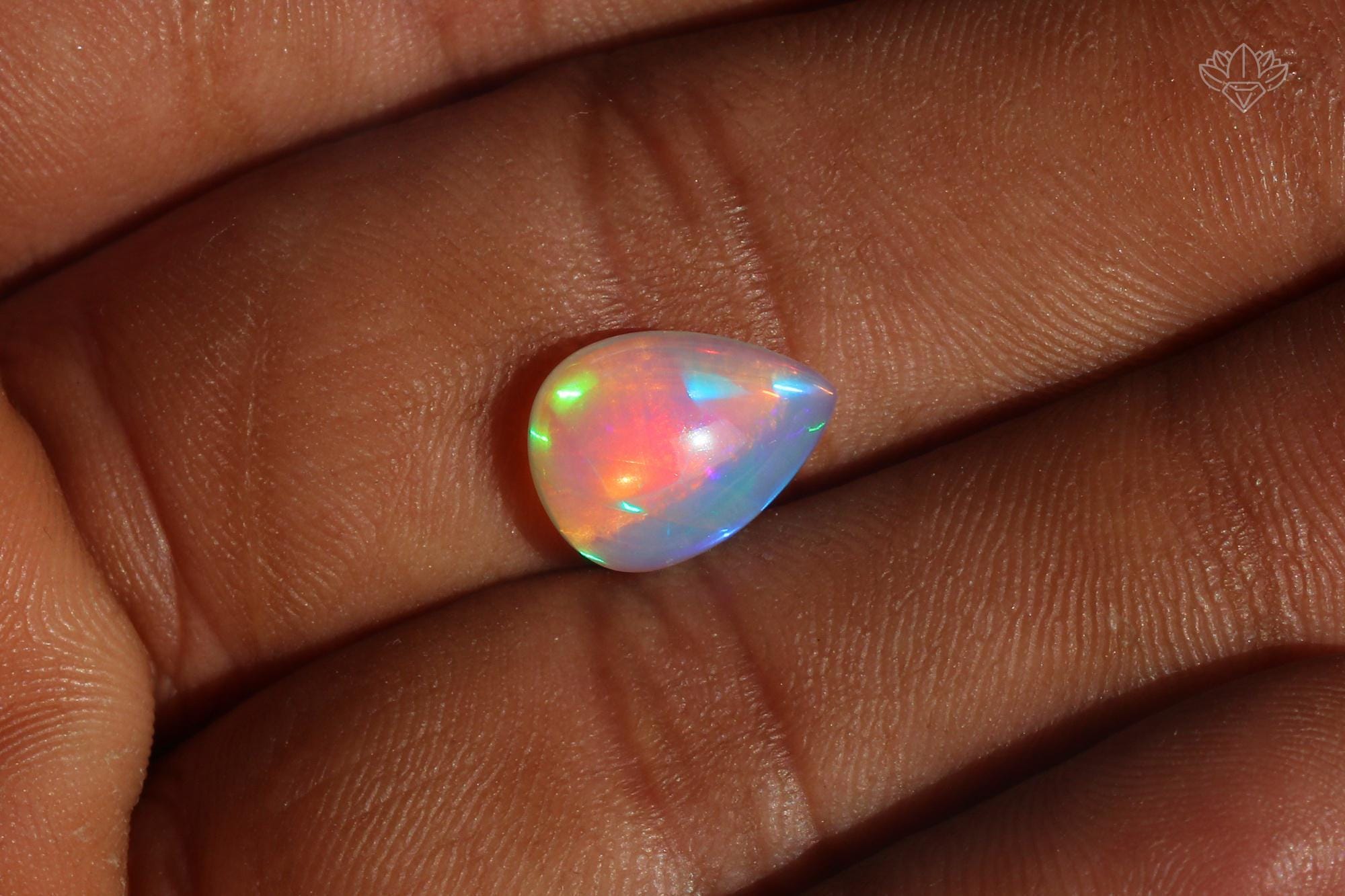 Ethiopian Opal Pear Cabochon: Multi-Fire Welo Gemstone, October Birthstone